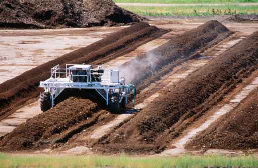 Machine Tilling Compost Waste